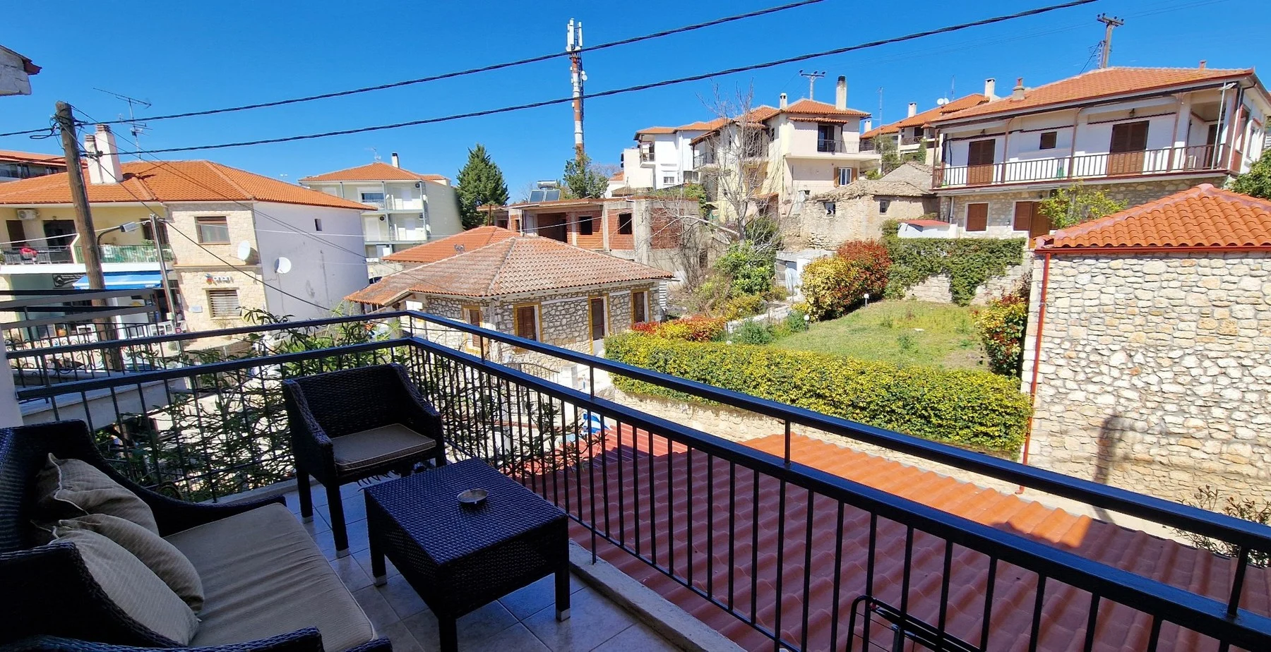 Furnished balcony with village view